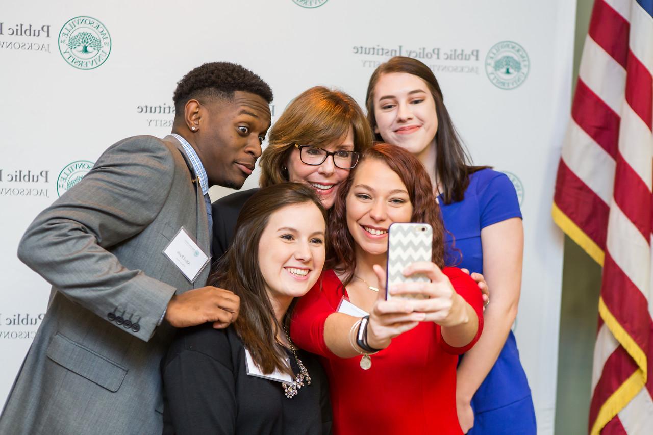 Public policy students taking a group photo.